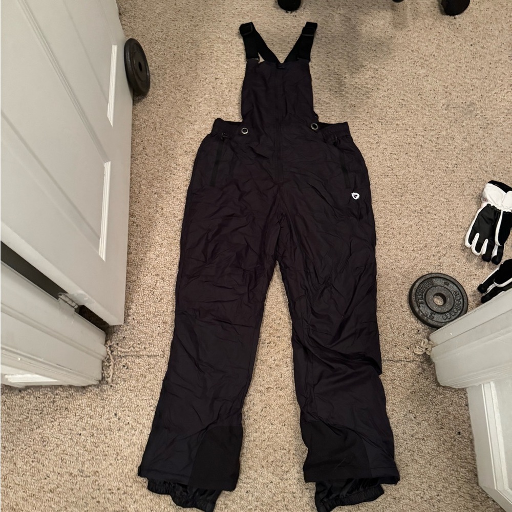 Women’s L snow bibs. Criss cross back